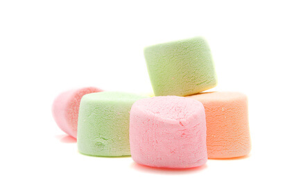 Colorful marshmallows isolated on white background